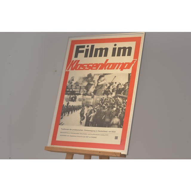 Film poster in the socialist realist style, "film in the class struggle," graphic artist v. Otten, using a collage of mass...