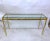 his elegant vintage console table combines thick glass with sturdy brass base. Unique Mid-Century table perfect for...