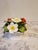 This is a beautiful bouquet of fine bone china. It is hand painted and produce by Aynsley in England