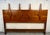 A striking mid-century modern queen-size headboard crafted from richly grained walnut in a sculptural, architectural form....