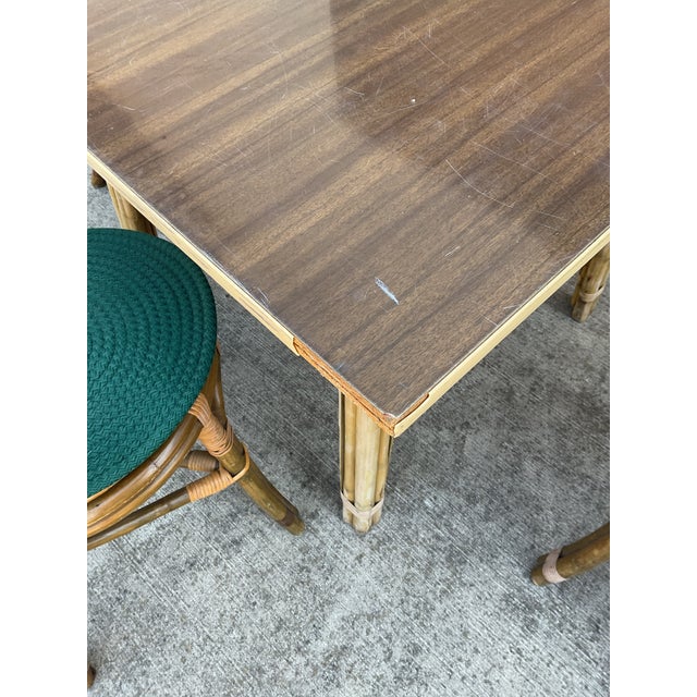 Vintage mid-century Calif Asia Dining Set. Chairs were made in Hong Kong. Dining table in the Philippines. Table is...