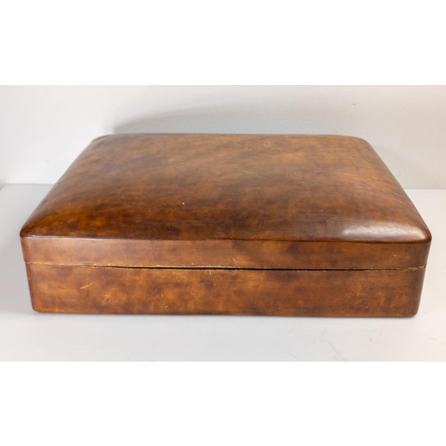 We are selling this great decorative pressed leather box. This box appears to be from the early to mid 20th century but is...