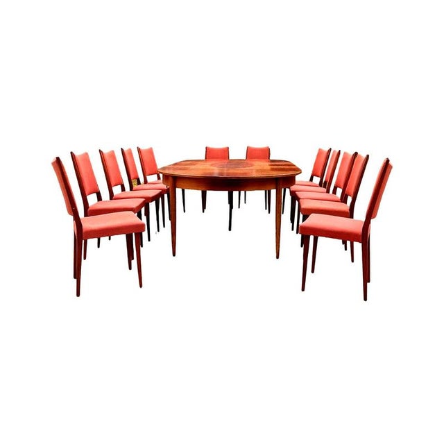 This rare set of 12 vintage dining chairs combines the refined simplicity of Scandinavian modernism with the high-quality...