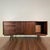 The “Nogal” credenza combines sleek modern design and contemporary comforts to redefine handmade heirloom quality...