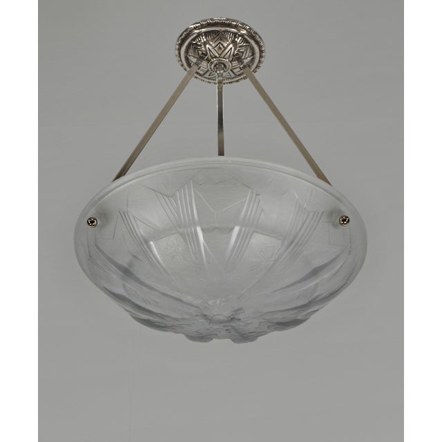 MULLER FRERES A French art deco bowl pendant light made circa 1925-1935 in nickel plated solid brass or bronze holding a...