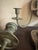 Pair of 1970s vintage Colonial Revival brass wall sconces with double candle arms and horse head relief mounts. Each...