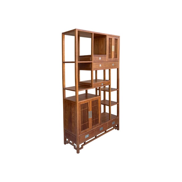 Elevate your living space with this exquisite Asian-inspired curio display cabinet, a perfect marriage of timeless...