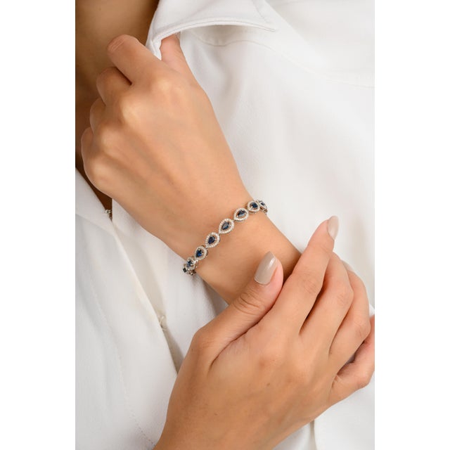 Modern Pear Cut Blue Sapphire & Halo Diamond Tennis Bracelet For Sale - Image 3 of 11