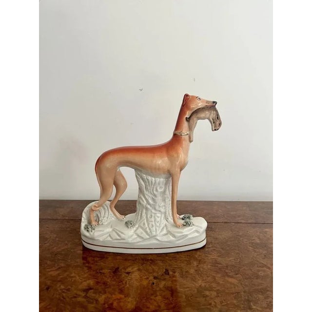 Unusually large antique Victorian staffordshire greyhound figure having an unusually large antique Victorian Staffordshire...