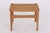 Small solid oak table with a small, reversible solid oak tabletop. The table was designed by Hans J. Wegner and...