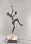 Émile Grégoire A French 1925-1930 art deco lamp in metal and pressed glass depicting a dancer with cymbals done a pure art...