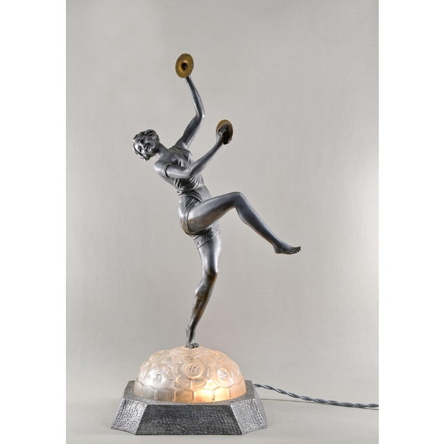 Émile Grégoire A wonderful French 1925-1930 art deco lamp in metal and pressed glass depicting a dancer with cymbals done...