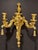 French Mid 20th Century Pair Of French Louis XVI Carved Giltwood 3-Arm Sconces For Sale - Image 3 of 8