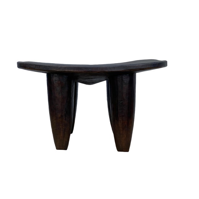 Superb African Senufo stool / table on four tapered legs with an abstract form . Carved from one piece of wood. Minor...