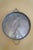 A large vintage decorative copper mold featuring a raised falcon on a branch in relief. The round form, warm copper...