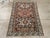 An antique Caucasian Zeychur Kuba throw rug. Three and a fraction eight point geometric ‘Lesghi’ stars in dark blue,...