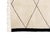 A clean, graphic geometry — a chain of connected diamonds runs down a soft ivory field, framed on either side by bold...