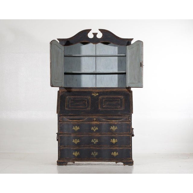 Baroque cabinet with secret drawers inside and beautiful carvings, curves and original hardware, circa 1800. H. 217...
