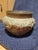 An impressive antique Art Nouveau copper jardinère featuring deeply repoussé decoration of naturalistic motifs that...