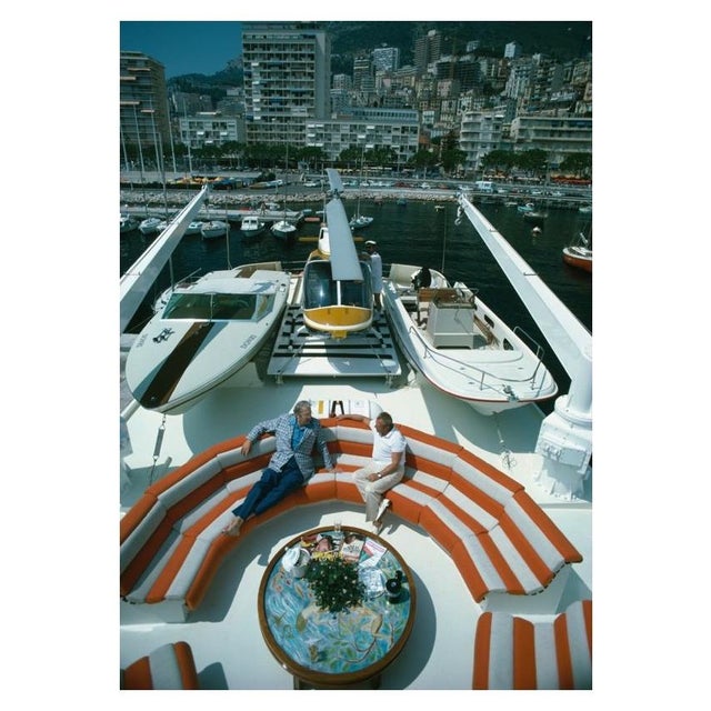 Transport Buffs 1961 A helicopter and two motor boats adorn the deck of a luxury yacht where Roy J Craven and Prince...