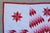 Early 20th century Eight Point Stars quilt with center mariners compass. beautiful red and white color pallet. floating...