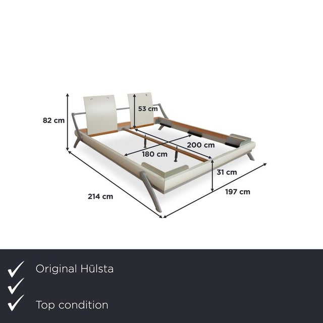 with this Hülsta Fancy wooden bed, you'll bring an absolutely exceptional design piece from the traditional German...