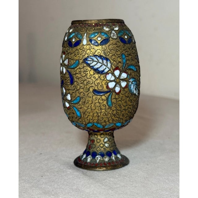 Up for sale is a rare antique 19th century handmade upside down Japanese champleve vase. It's made out of a gilded bronze...