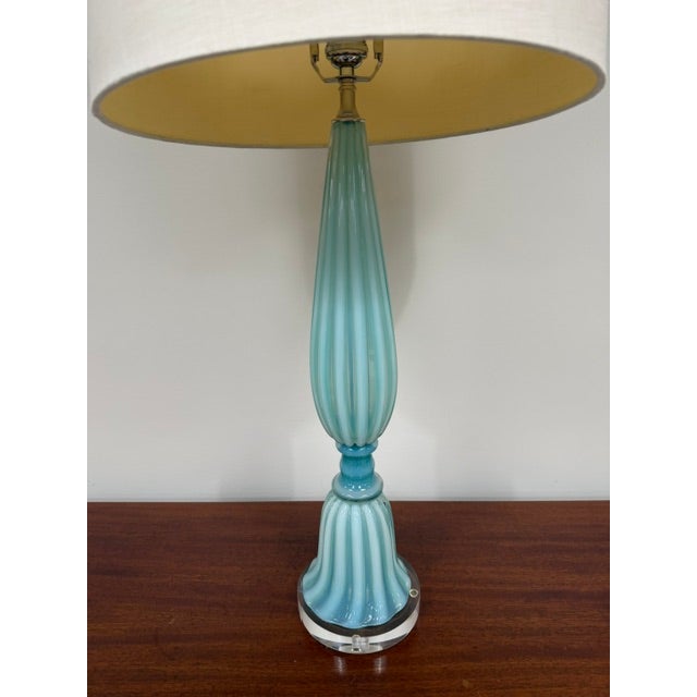 Beautiful Vintage Turquoise Murano Opaline Glass Lamp With Ribbed and Flared Shape on Lucite Base.