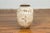 A Thai Sawankhalok exterior water jar from the mid-19th century, with distressed white patina. Created in the kilns of...