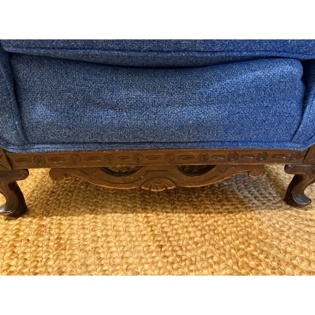 Wooden and upholstered chair that has been in my family for probably around 100 years. Has been reupholstered a few times...