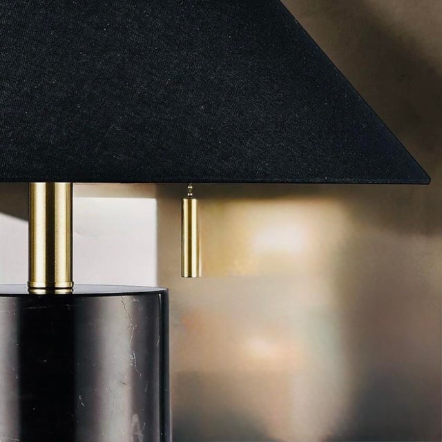 Edgy and modern, this heavy marble lamp features a striking black solid marble column, a double gold pull-chain, and its...