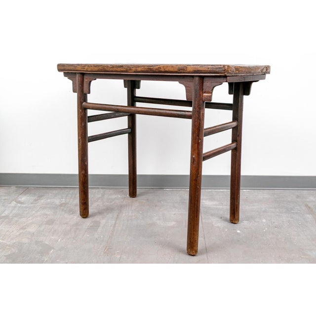 A Qing Dynasty farmhouse style console table with simple straight pole legs and stretchers made using traditional Chinese...