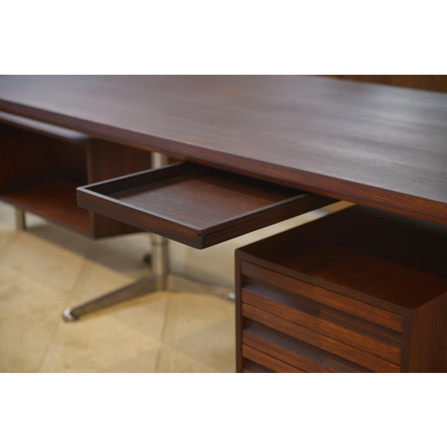 Stunning Italian modernist desk, model T95, designed by Osvaldo Borsani for Tecno. The piece captivates with its...
