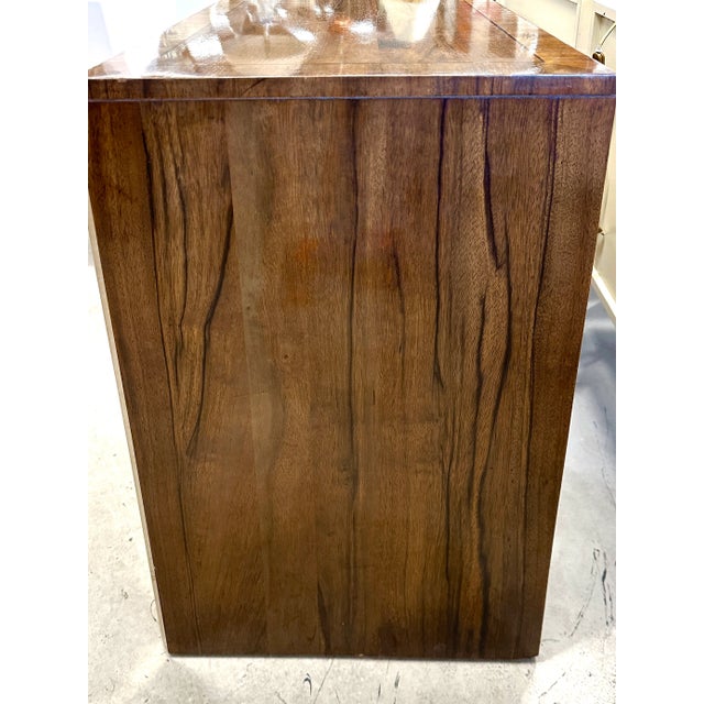 A beautiful brass and walnut Mastercraft dimunitive chest of drawers produced in the 1970’s. Nice graining to the walnut...