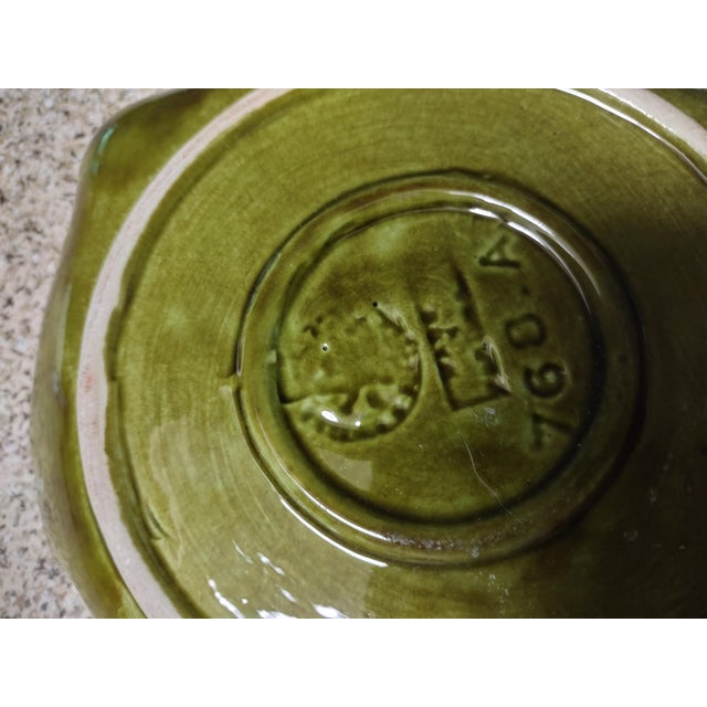 Believe this to be an early Bordallo Pinheiro cabbage plate from their longstanding line. It is not Dodie Thayer but it's...