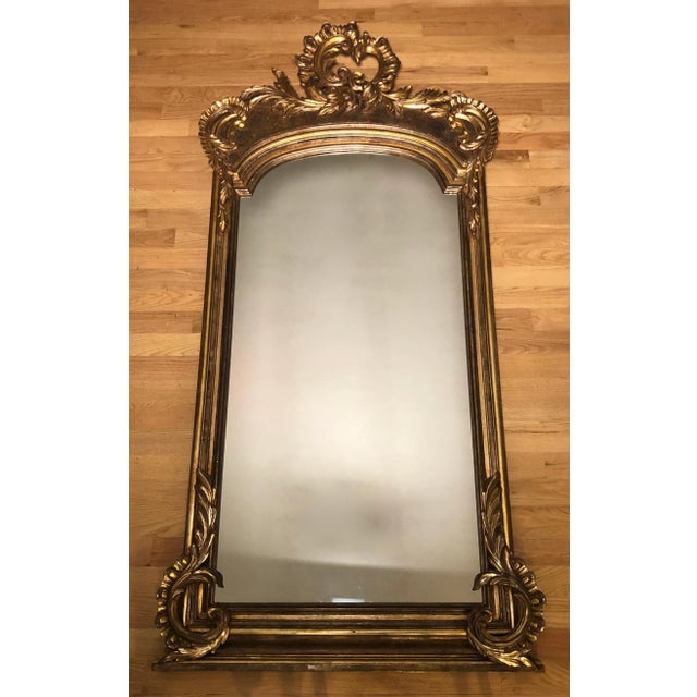 Large and Impressive Louis XV mirror. Painted and gilt mirror of large scale with areas of silver gilding.