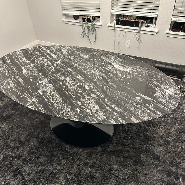 This is a Knoll Saarinen Dining Table in black Portoro marble. An authentic example of Eero Saarinen’s iconic mid-century...