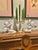 This pair of white porcelain angels are blowing their brass trumpets to signal holiday joy. They were offered by...