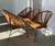 Beautiful set available of 5 midcentury rattan lounge chairs. A nice slim black lackered base with nice round feet ends...