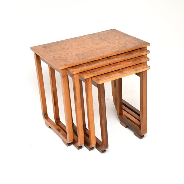A superb original Art Deco burr walnut nest of four tables. They were made in England, and date from the 1930’s. They are...