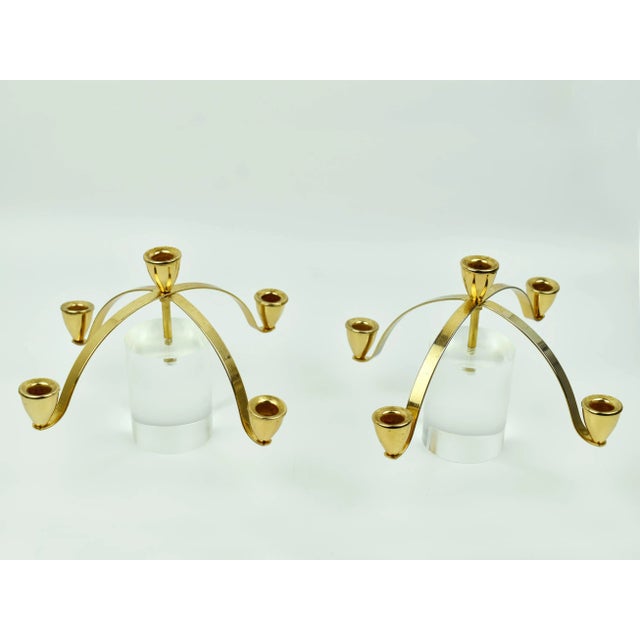 Elevate your home decor with this stunning set of two Mid Century Modern candelabras, each featuring a sleek Lucite...