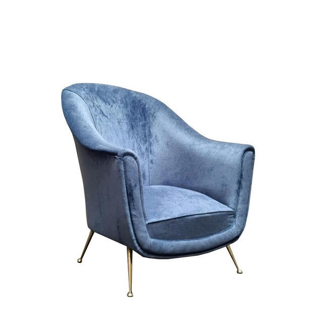 Isa bergamo rare armchair or lounge chair with brass legs. This elegant armchair model features a classic shape composed...