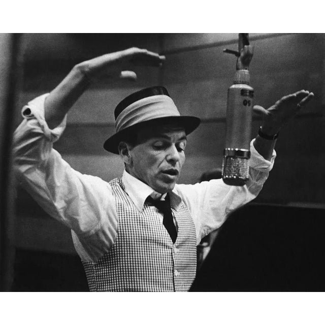 "Frank Sinatra Recording Session" by Murray Garrett American singer and actor Frank Sinatra (1915 - 1998) gestures with...