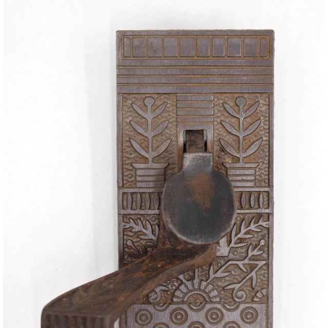 Antique Aesthetic style door pull made of cast iron with a thumb latch. The original mounting screws are not available....