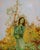 In "Girl in Green I," a young woman stands amidst a lush, autumnal landscape, her contemplative expression inviting...