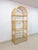 This gorgeous vintage arched rattan and wicker bamboo shelf is a stunning natural statement piece. Five glass shelves sit...