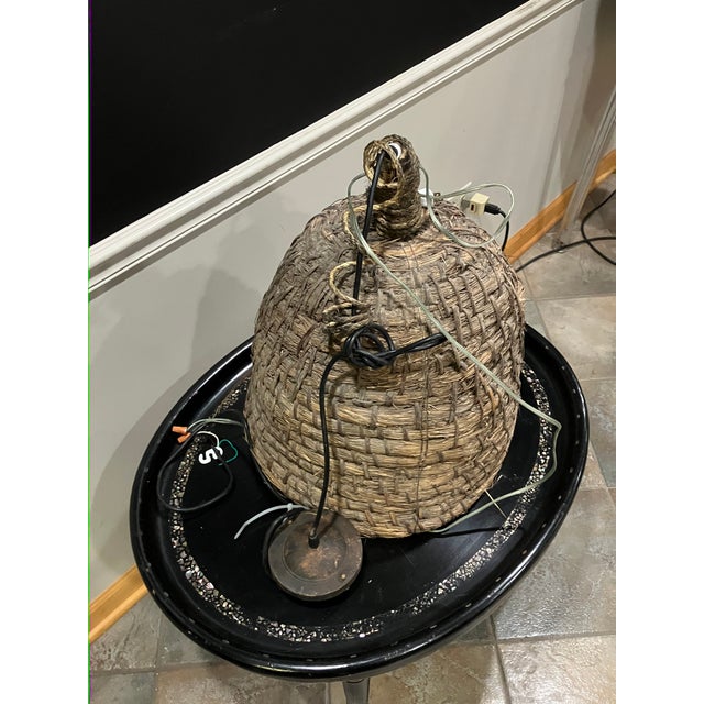 Woven basket chandelier originating from the Pyrenees region, circa 1940s. Constructed from natural fiber in a tightly...