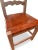 A handsome set of eight Spanish Colonial Revival dining side chairs, each with a ladder back of three hand-carved...