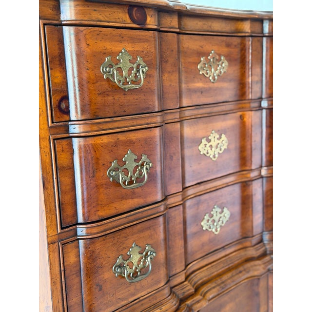 An elegant example of 1970s American Colonial Revival furniture, this beautiful six-drawer highboy chest was manufactured...