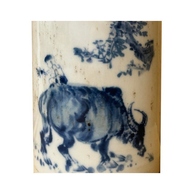 This vintage style Chinese blue and white porcelain brush pot (Bitong) showcases the refined artistry of the Republic...